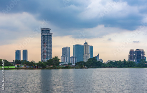 Tangerang  Indonesia - 5th January 2018  A view of Kelapa Dua Lake in the foreground and Lippo Karawaci district buildings in the background. Taken in a cloudy afternoon. Property investment.