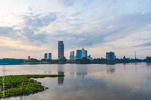 Tangerang  Indonesia - 5th January 2018  A view of Danau Kelapa Dua  Kelapa Dua Lake  on the foreground and Lippo Karawaci district buildings in the background. Taken in a cloudy afternoon.