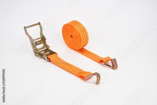 The sling for fastening cargoes is isolated on a white background.tie down strap ratchet