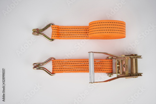 The sling for fastening cargoes is isolated on a white background.tie down strap ratchet