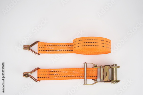 The sling for fastening cargoes is isolated on a white background.tie down strap ratchet photo
