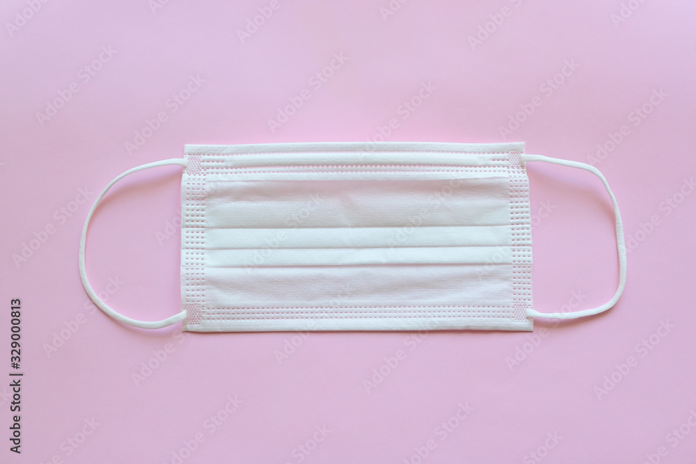 medical hygiene face mask on pink background medical hygiene face mask on pink background