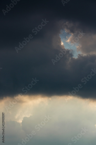 sunlight through cloud on dramatic sky after the rain