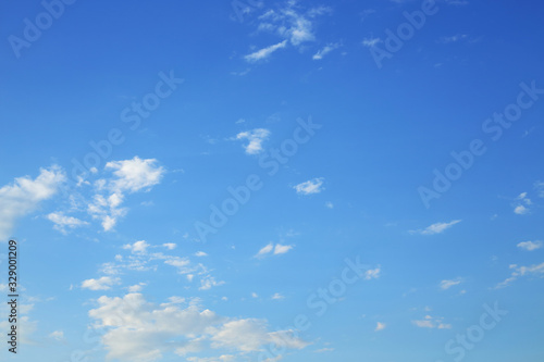 fluffy white cloud moving above clear blue sky in the morning day