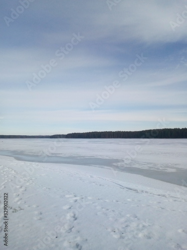 winter landscape with lake and sky