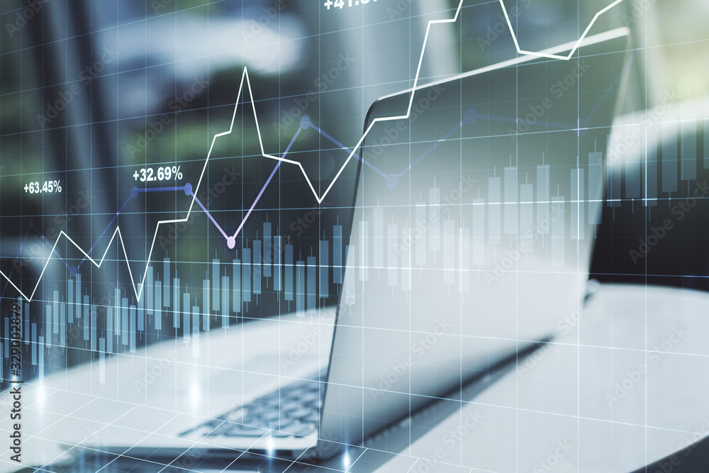 Abstract creative financial graph on modern laptop background, financial and trading concept. Multiexposure Abstract creative financial graph on modern laptop background, financial and trading concept. Multiexposure