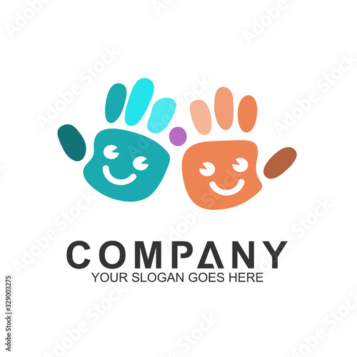  Kids care logo. Vector of hands with smiling child's face. Education and creative children icon