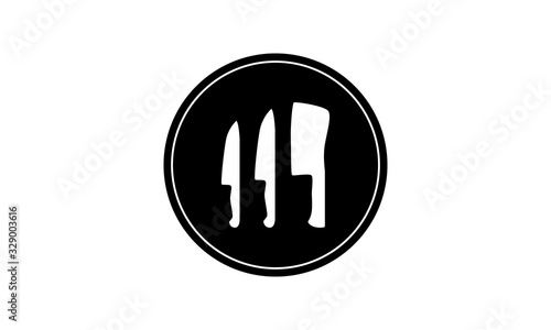 Vector with flat dark black circle with circular cutout and cutouts of in the shape of two knives and a cleaver. Icon is great for chef, restaurant, butcher or cutlery logo or badge.