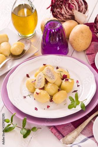 Potato gnocchi stuffed with radicchio and ricotta.