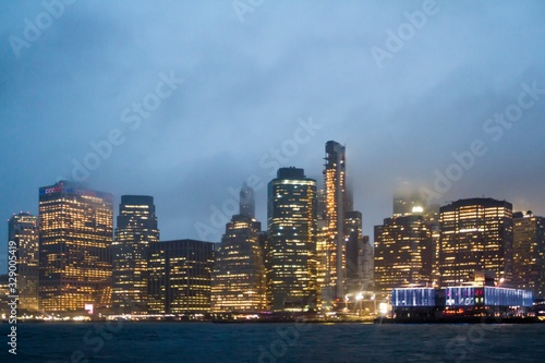 Beautiful view of New York city skyline with waterfront at twilight  USA