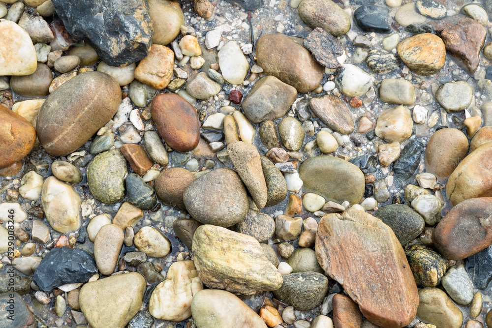 Background of pretty pebbles stone on the beach . Background of pretty pebbles stone on the beach .
