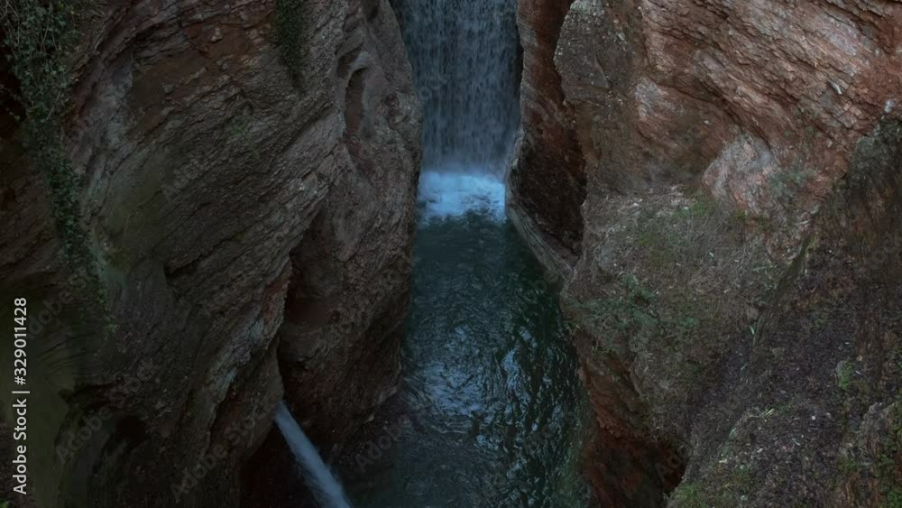Beautiful Waterfall near Trento, Italy; Orrido di Ponte Alto; slow camera pan down Beautiful Waterfall near Trento, Italy; Orrido di Ponte Alto; slow camera pan down