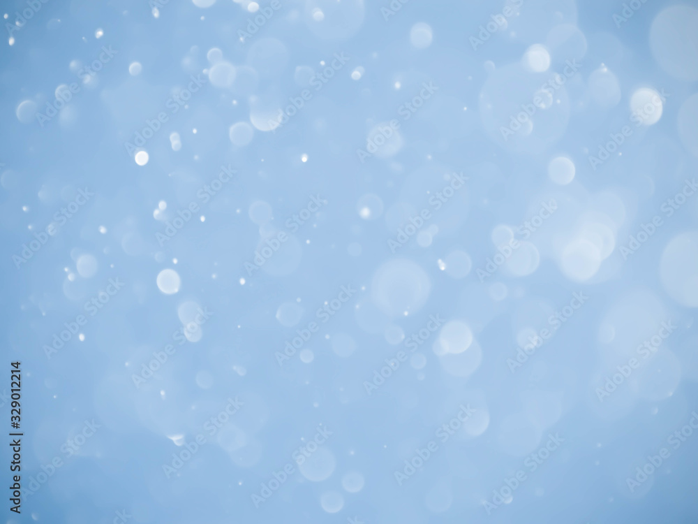 Abstract blue bokeh background.Blurred bright light. Abstract blue bokeh background.Blurred bright light.