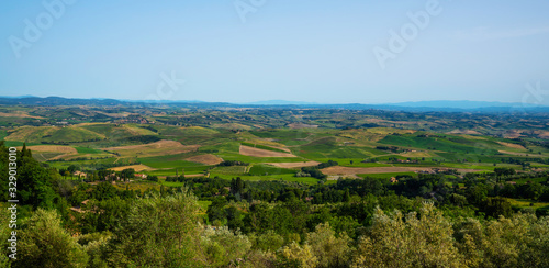 Traditional countryside and landscapes of beautiful Tuscany. Fields and vineyards. Holiday, traveling concept. Agro tour of Europe. Beautiful world.