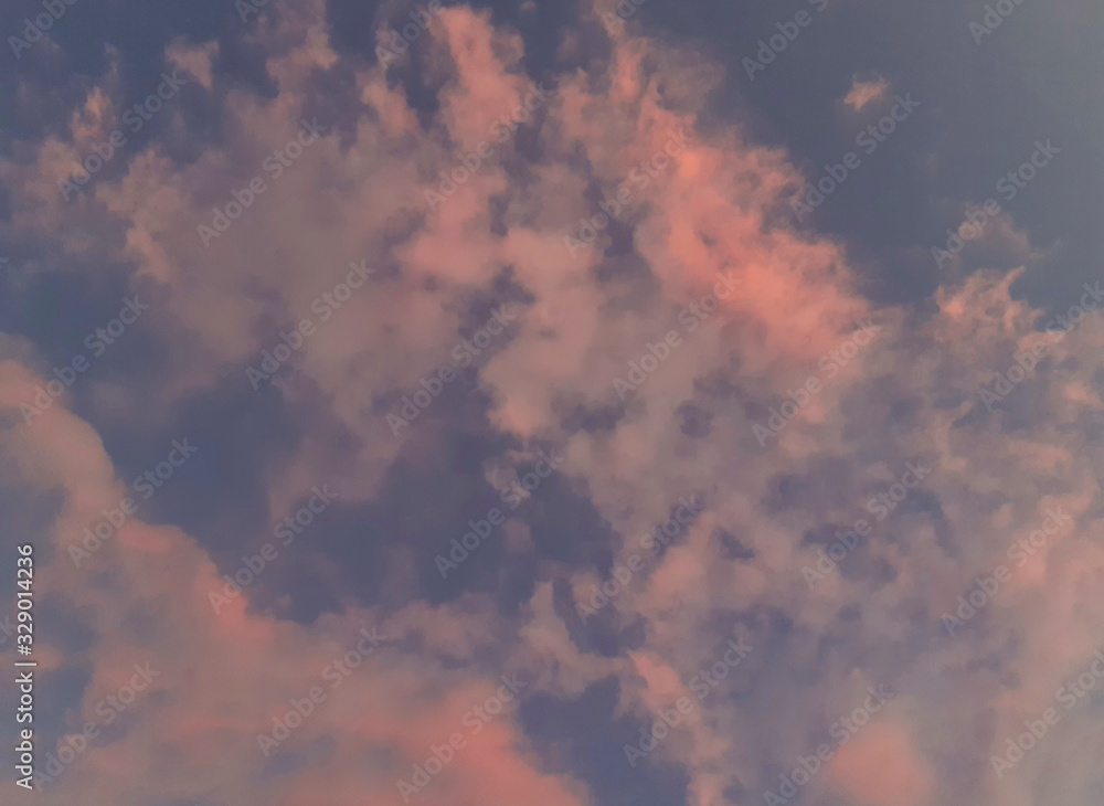 Beautiful pink sky in the evening summer, and gold cloud for texture, with clouds at sunset.