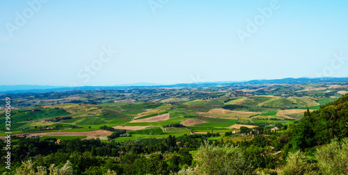 Traditional countryside and landscapes of beautiful Tuscany. Fields and vineyards. Holiday  traveling concept. Agro tour of Europe. Beautiful world.