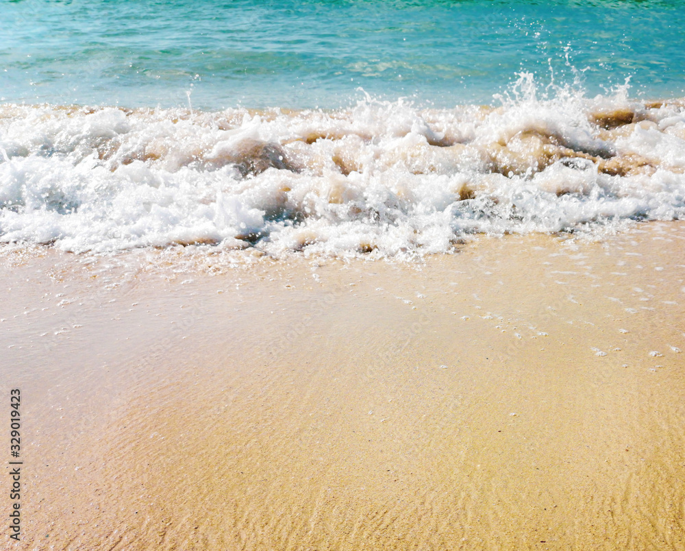 sand and water on the seashore as a background sand and water on the seashore as a background