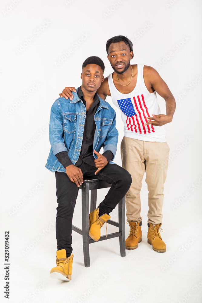two handsome african men on a white background two handsome african men on a white background