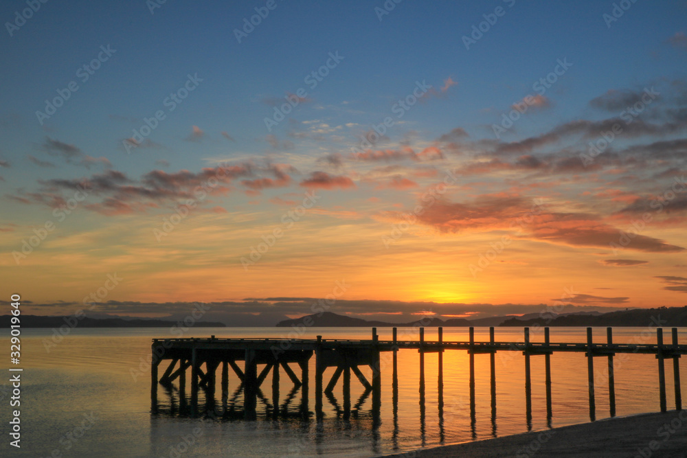 Sunrise over pier