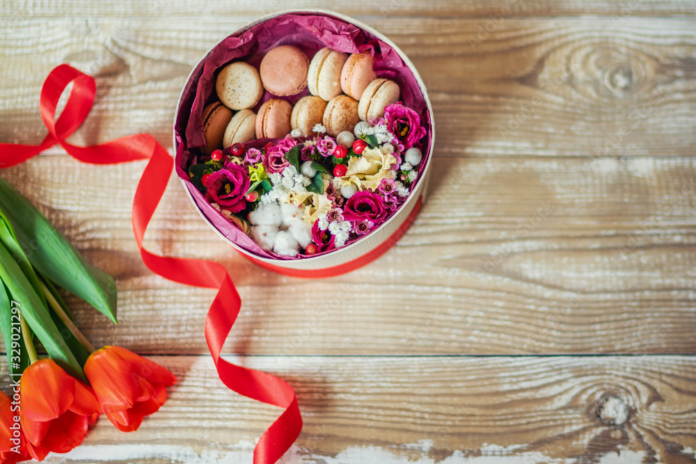 Spring flowers. Tulips flowers on rustic wooden background. Copy space.