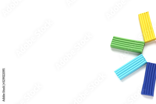 multi-colored plasticine on a white background. Educational games for children