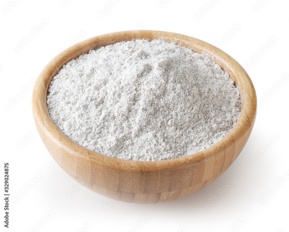 Rye flour in wooden bowl isolated on white background with clipping path Rye flour in wooden bowl isolated on white background with clipping path