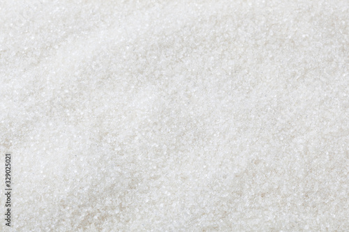 White granulated sugar background