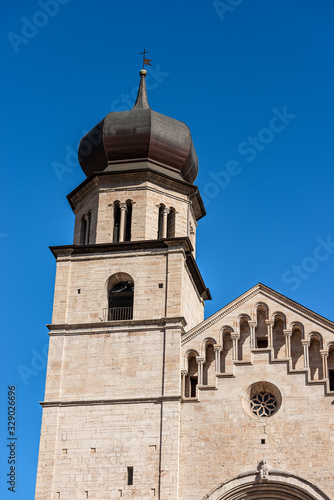 Closeup of San Vigilio Cathedral (Duomo di Trento, 1212-1321) with the bell tower and facade in Romanesque style, Trento downtown, Trentino-Alto Adige, Italy, Europe © Alberto Masnovo