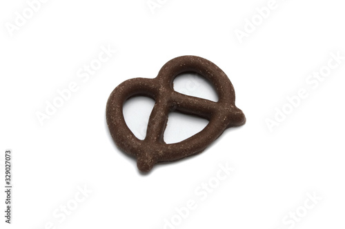 Pretzel with Chocolated biscuit flavored and coated chocolated cream on white background.
