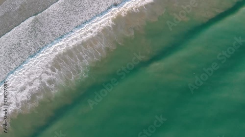 Aerial shot of a beautiful surf beach in the Coromandel, New Zealand photo