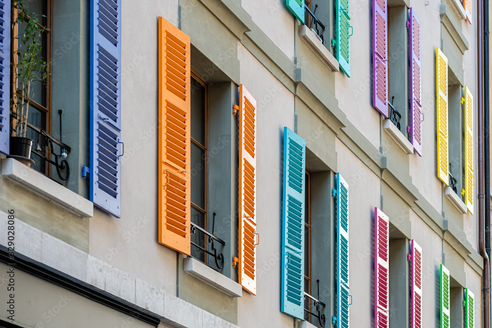 Windows with different color shutters. Geneva, Switzerland Windows with different color shutters. Geneva, Switzerland