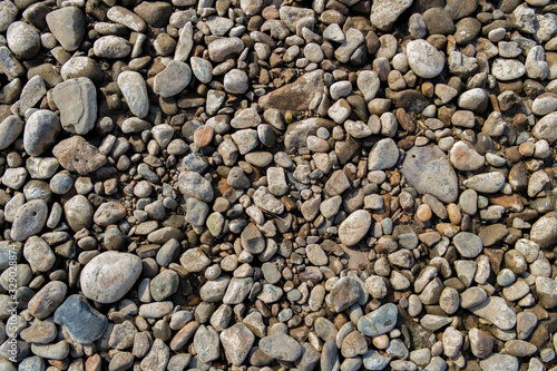 Pebble stone background. Sea Pebble. Beach stones. Natural background. Stone texture.