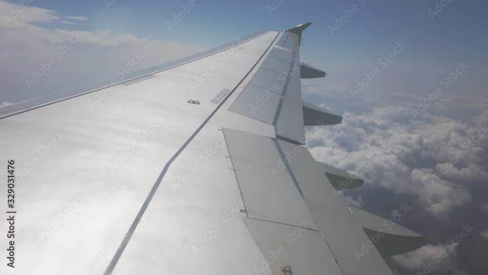 wing airplane and clouds on the sky wing airplane and clouds on the sky