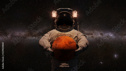 astronaut holding planet Mars in front of the Milky Way galaxy 