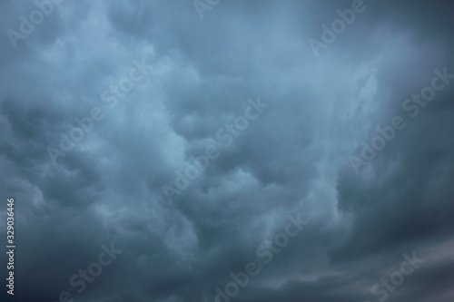 Blurred dramatic sky background. Exciting dark stormy clouds before rain