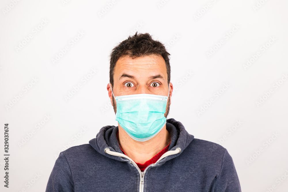 man with a mouthguard isolated against white background man with a mouthguard isolated against white background