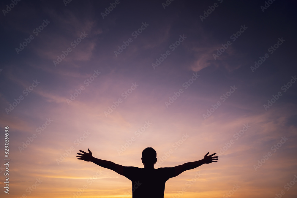Copy space of man rise hand up on sunset sky and cloud abstract background.
