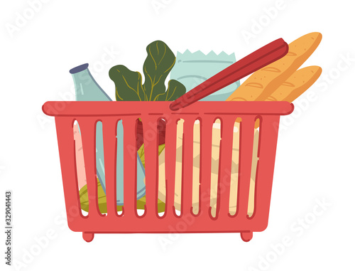 Food in shopping basket, vegetables and bread, milk bottle