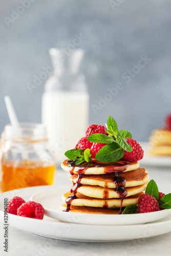 Sweet pancakes with raspberry