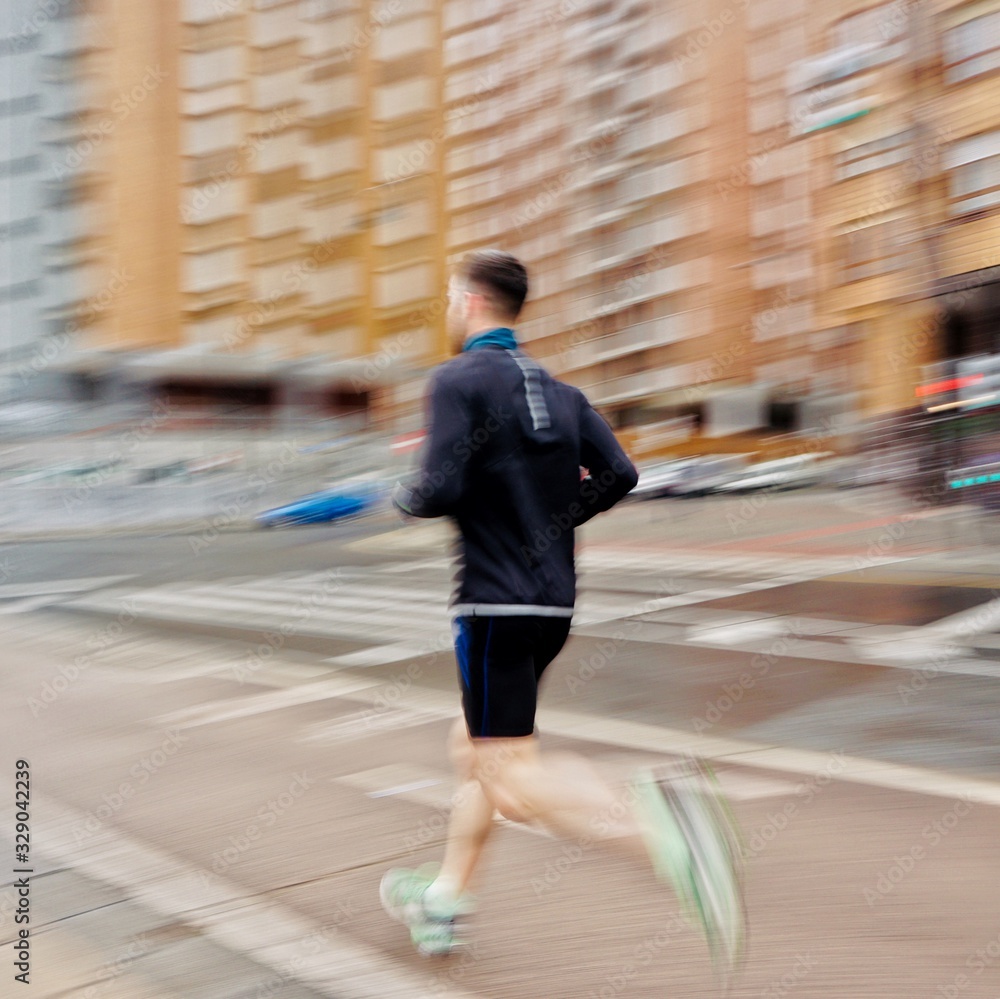 people running on the street in Bilbao city Spain, people getting fit people running on the street in Bilbao city Spain, people getting fit