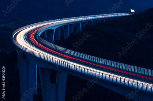 Global transport and logistics connection. Heavy traffic on the modern and futuristic highway.
