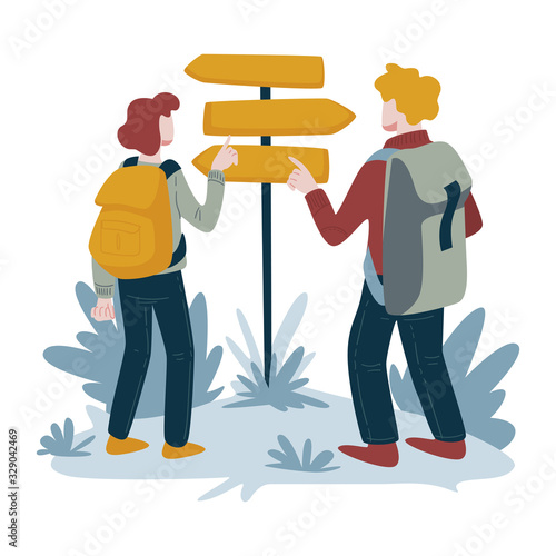 Hikers and direction pointer, man and woman backpacking