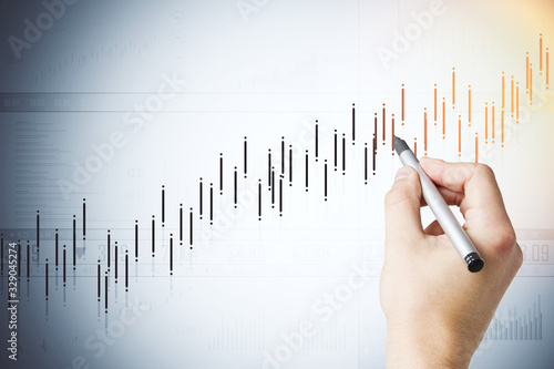 Hand drawing business charts photo