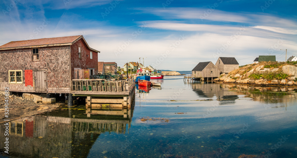 Fototapeta premium Beautiful Peggy's Cove on the coastline of Nova Scotia Canada on a fine August afternoon.