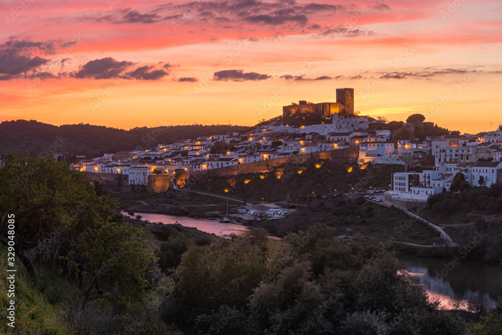 Sunset in Mertola, village of Portugal and its castle. Village in the south of Portugal in the region of Alentejo.