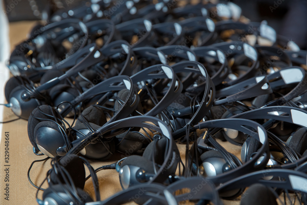 headphones used for simultaneous translation equipment simultaneous interpretation equipment . A set of headphones for simultaneous translation during negotiations in foreign languages. headphones used for simultaneous translation equipment simultaneous interpretation equipment . A set of headphones for simultaneous translation during negotiations in foreign languages.
