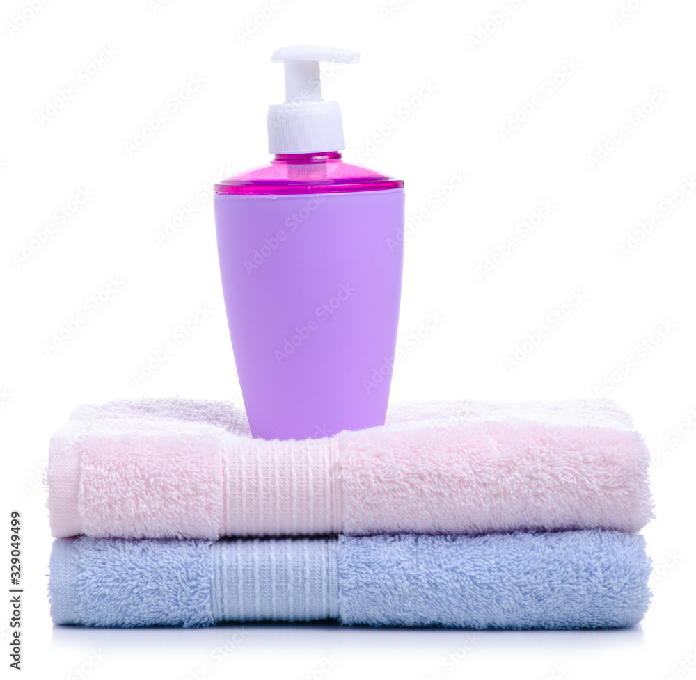 Liquid soap with dispenser with towel, washing and hygiene on white background isolation Liquid soap with dispenser with towel, washing and hygiene on white background isolation