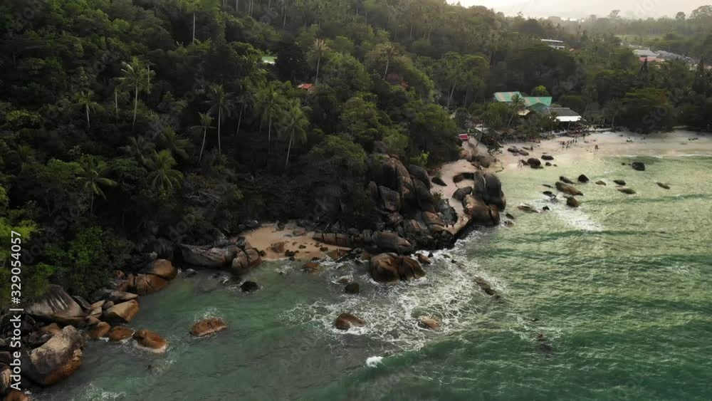 Tilt Up Aerial View of Coast and Coastal Tropical Rainforest. Silver Beach, Koh Samui Island, Thailand Tilt Up Aerial View of Coast and Coastal Tropical Rainforest. Silver Beach, Koh Samui Island, Thailand