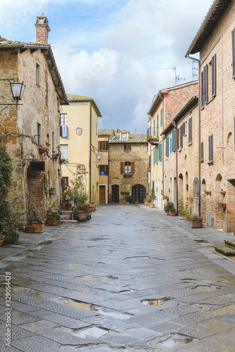 Walk on a rainy day through the streets of the beautiful town, Pienza, Tuscany