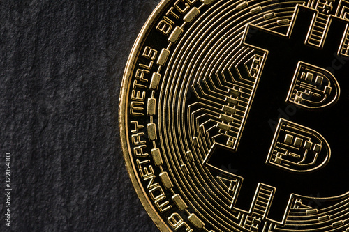 Gold Coin Bitcoin On Dark Background. Close up . Cryptocurrency.